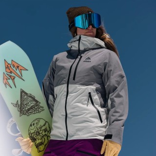 Ali Miller is wearing the Women's MTN Surf Recycled Jacket in Smoke Gray