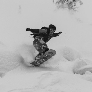 Jones rider Inaki Odriozola wears the Men's MTN Surf Recycled Shell Jacket in Deep Purple