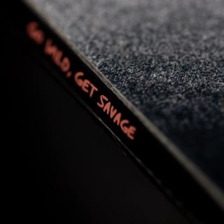 Detail shot of the Victor De Le Rue Signature Series Howler sidewall messaging saying get wild, get savage